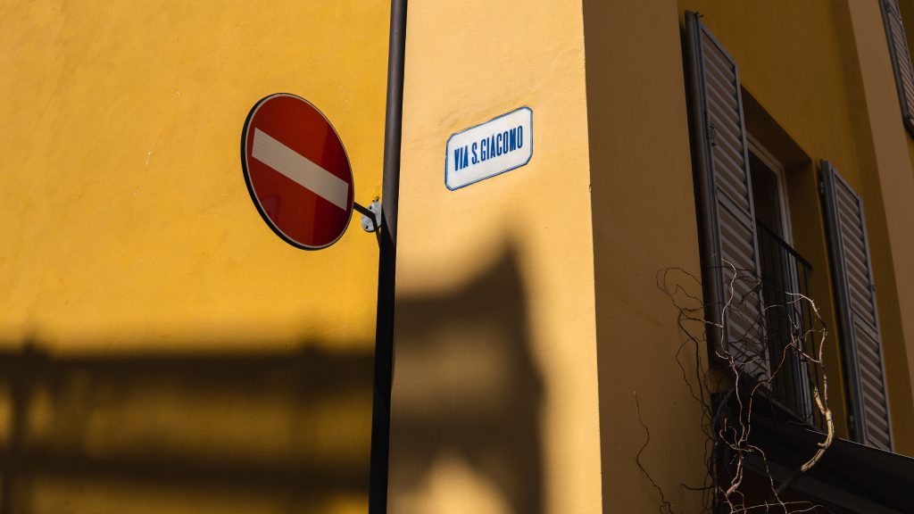 A corner in Modena, with some signage.